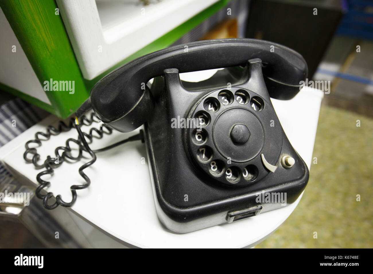 Old vintage telephone with rotary dial numbers. Vintage items, back to basics, retro love