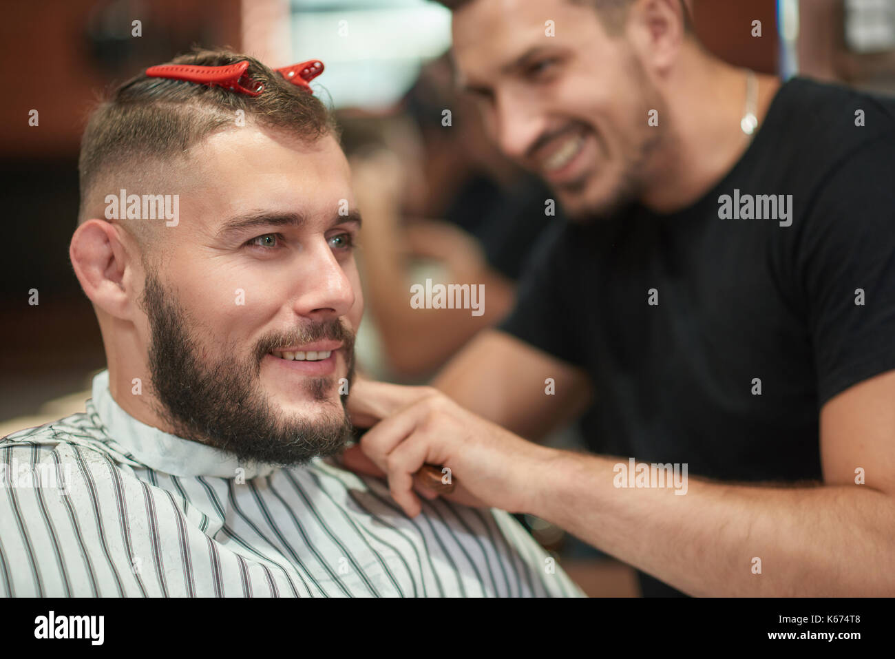 Young man at the barbershop Stock Photo