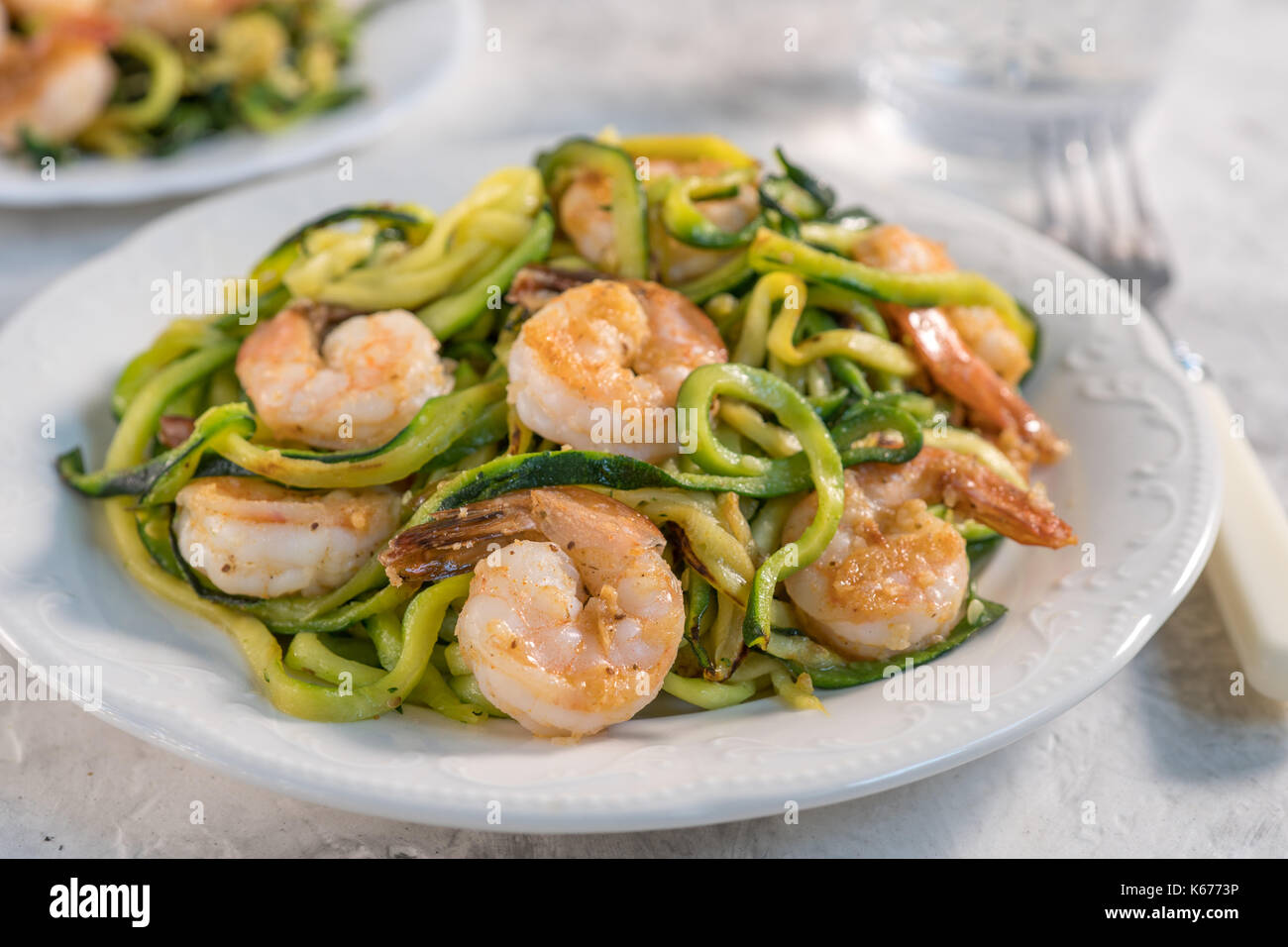 Skinny Shrimp Scampi with Zucchini Noodles. Low carb meal Stock Photo
