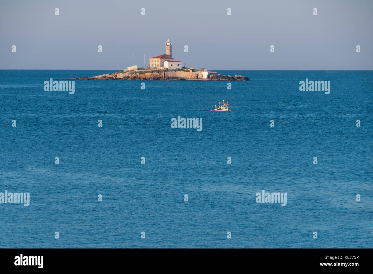 Lighthouse on a small island Sveti Ivan near Rovinj, Croatia Stock Photo