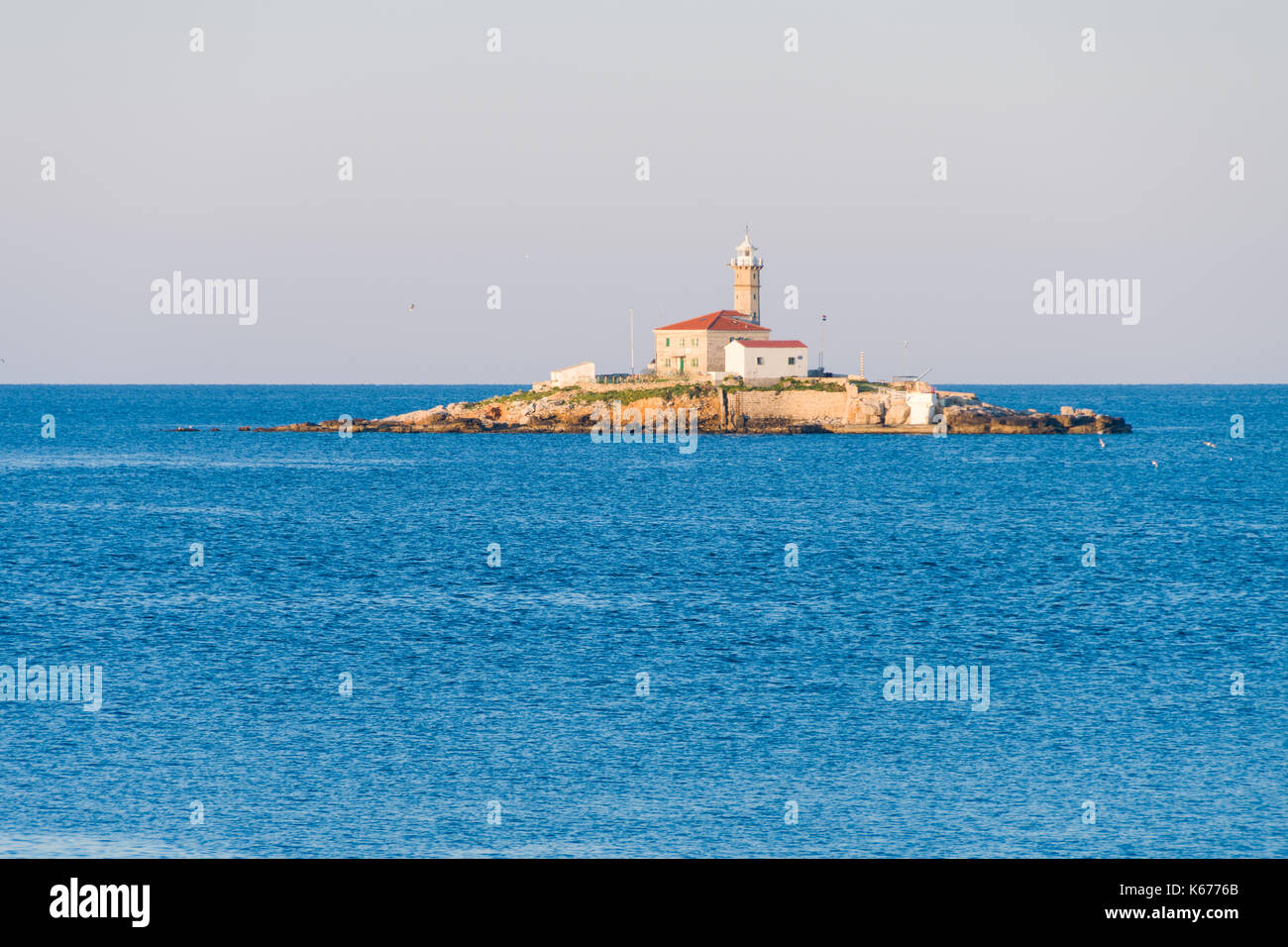 Lighthouse on a small island Sveti Ivan near Rovinj, Croatia Stock Photo