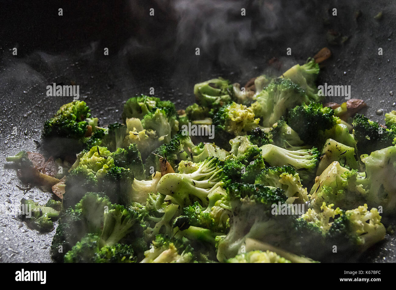Broccoli with garlic in a frying pan Stock Photo Alamy
