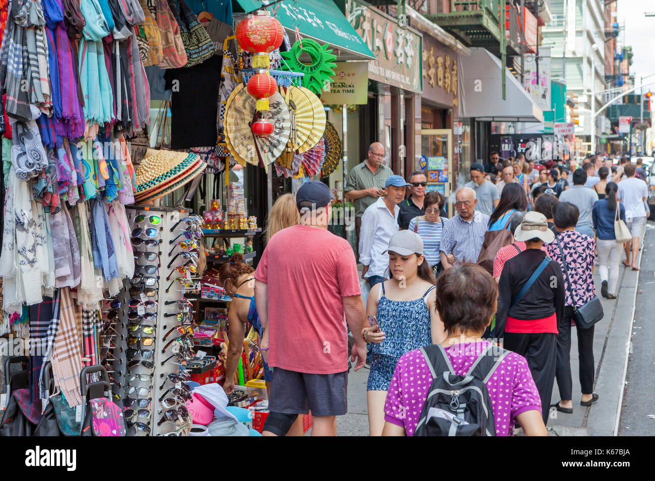 Pedestrians walk in Chinatown, New York City Stock Photo Alamy