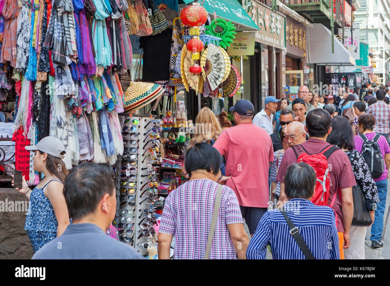 Pedestrians walk in Chinatown, New York City Stock Photo Alamy