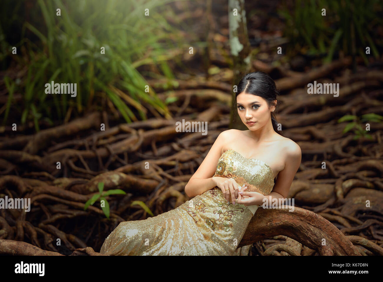 Portrait of a glamorous woman in forest, Thailand Stock Photo