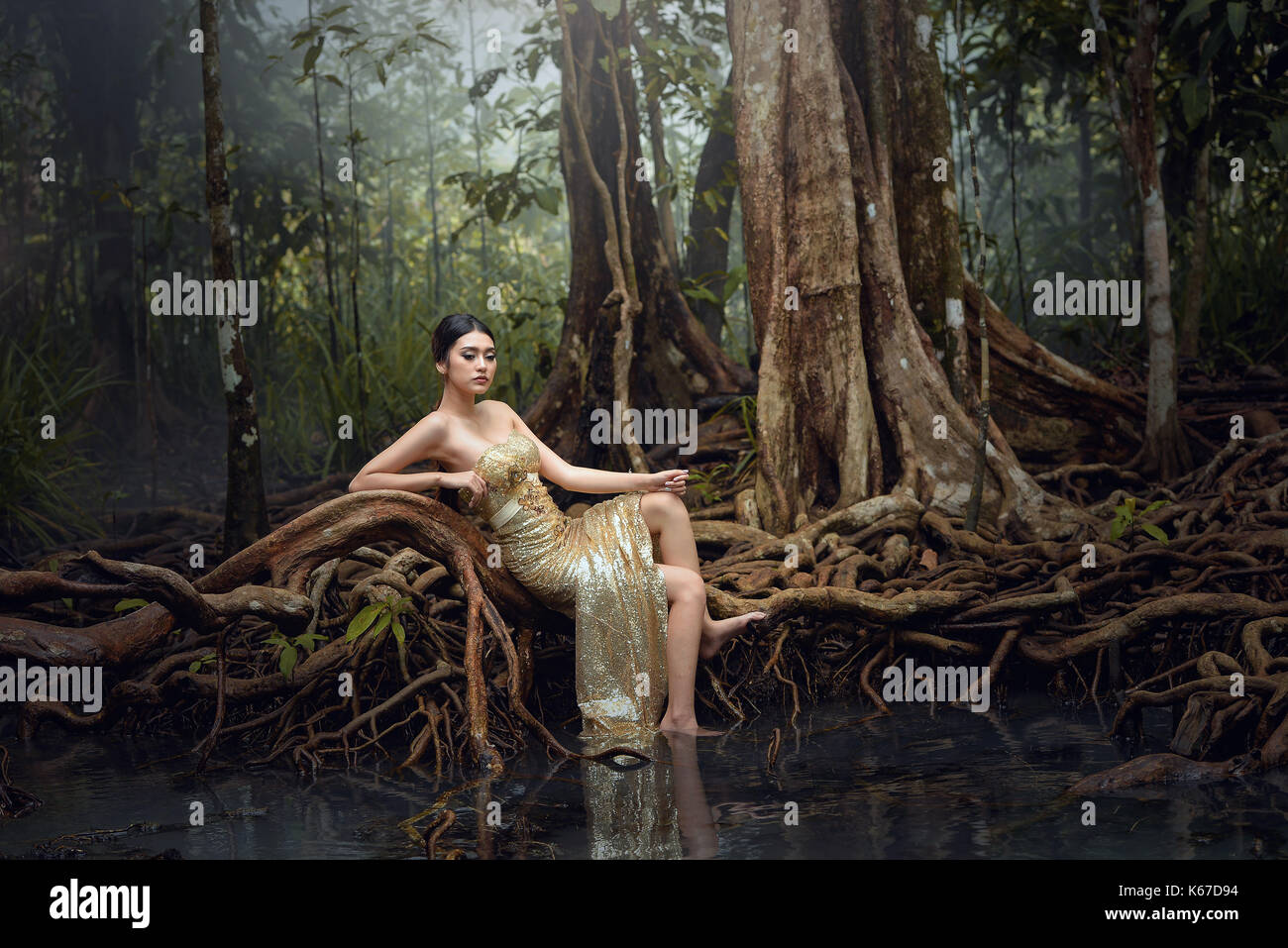 Portrait of a glamorous woman in forest, Thailand Stock Photo