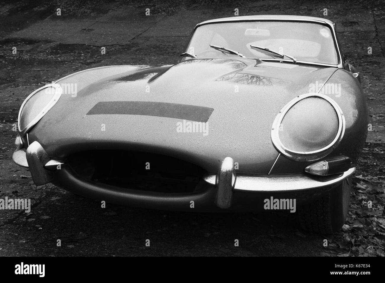 E Type Jaguar covered in rain drops on the Brooklands Banking Stock Photo
