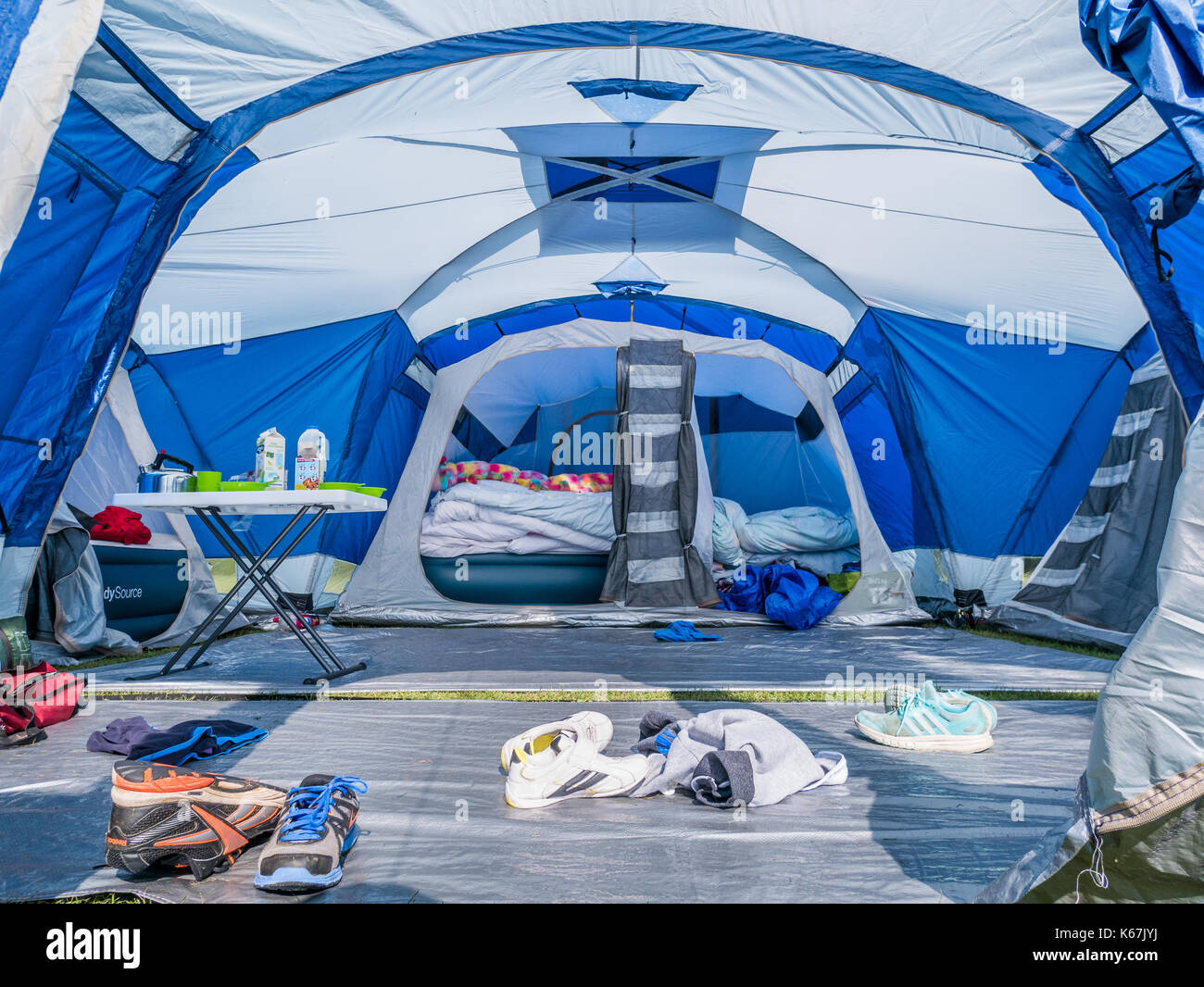Interior of a family tent for camping outdoors in a field Stock Photo -  Alamy