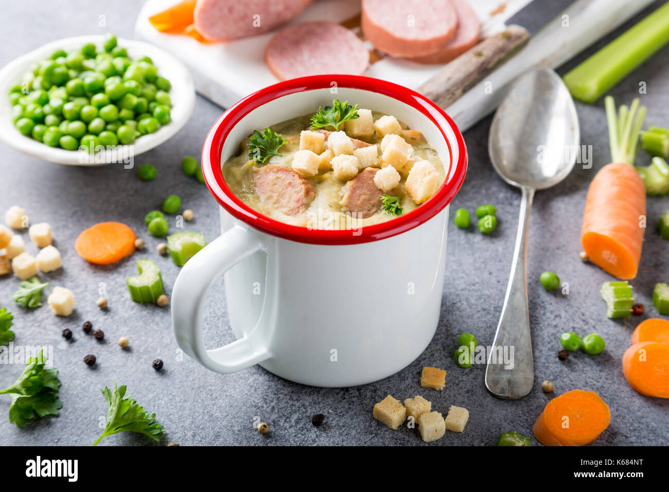 Homemade pea soup with sausage and croutons Stock Photo Alamy