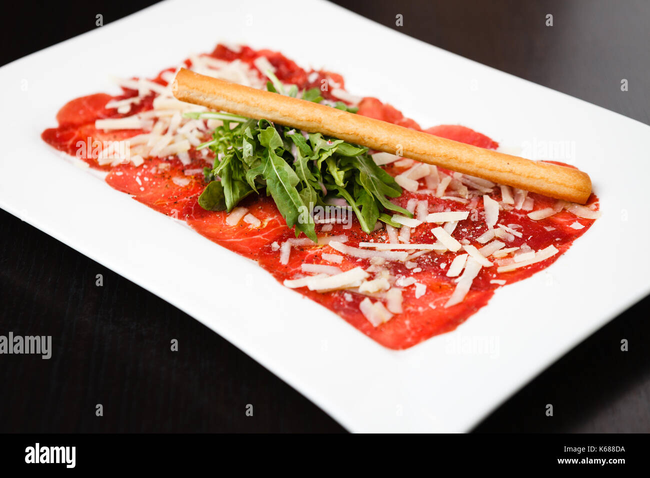 Meat carpaccio with Parmesan Stock Photo
