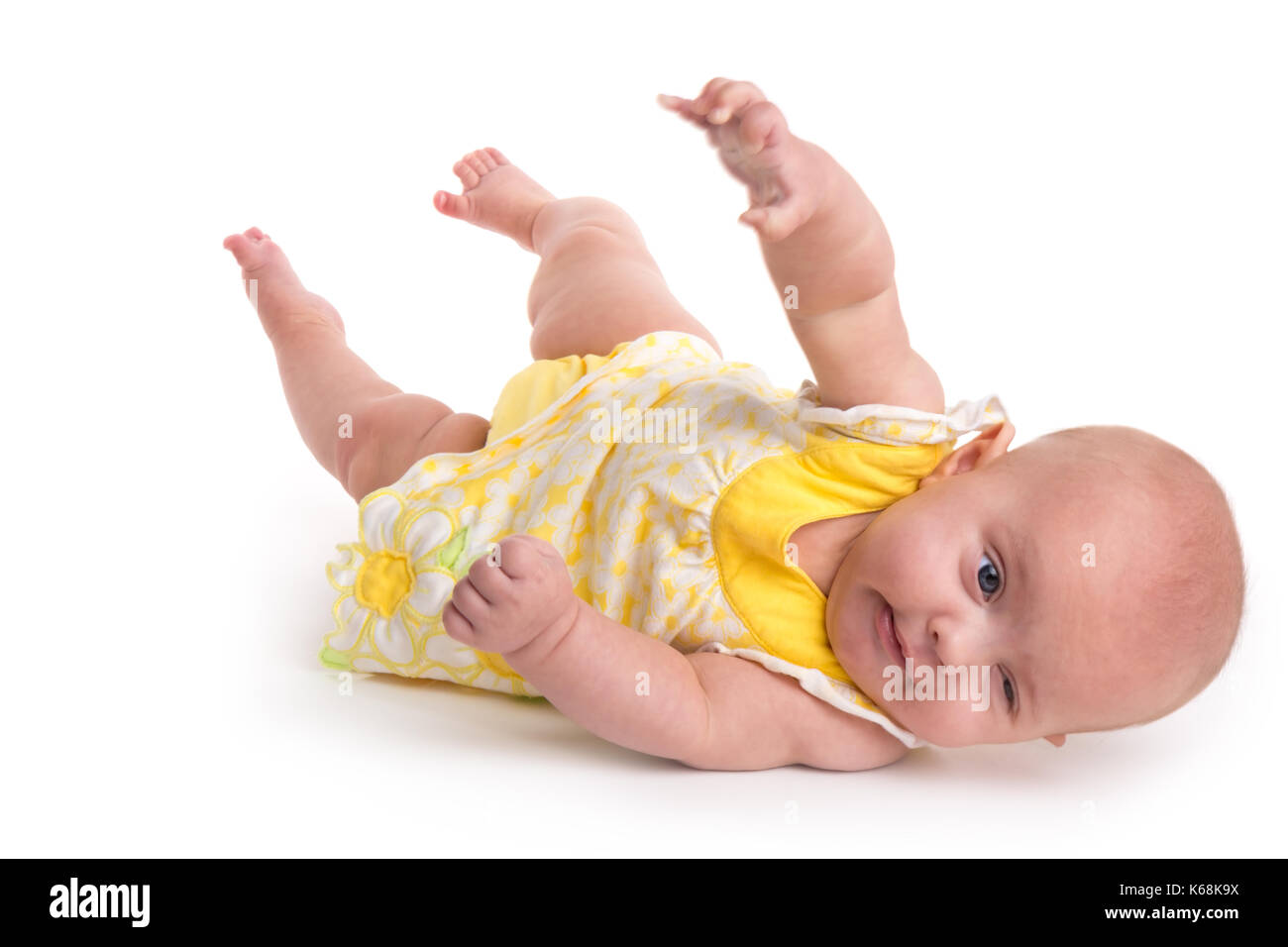 Cute baby rolling over isolated on white background Stock Photo