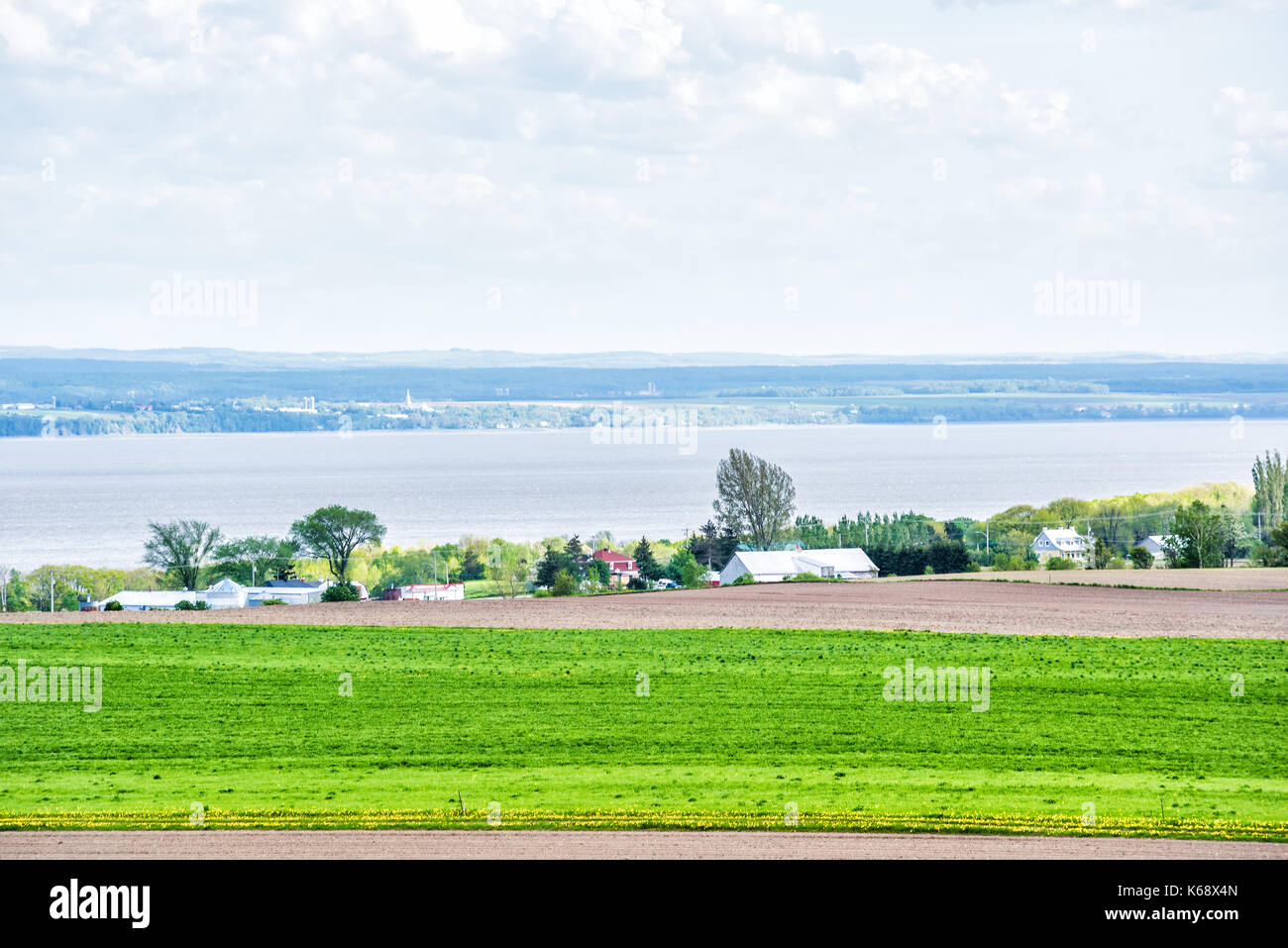 Aerial cityscape landscape view of farmland in Ile D'Orleans, Quebec