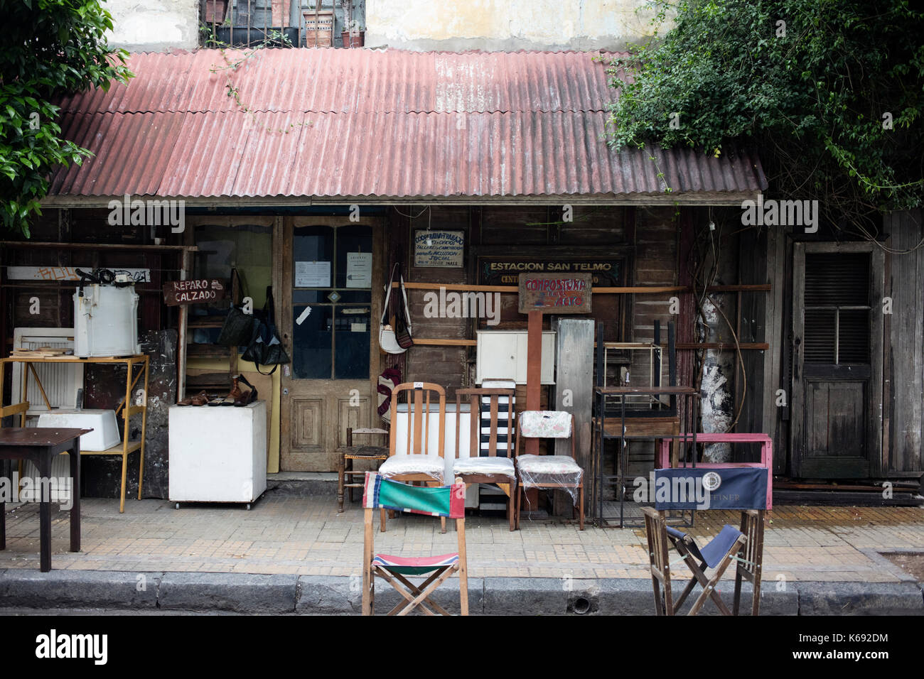 BUENOS AIRES, ARGENTINA - SEPTEMBER 2017 - Old Repair shop of shoes and furniture in San Telmo Neighborhood Stock Photo