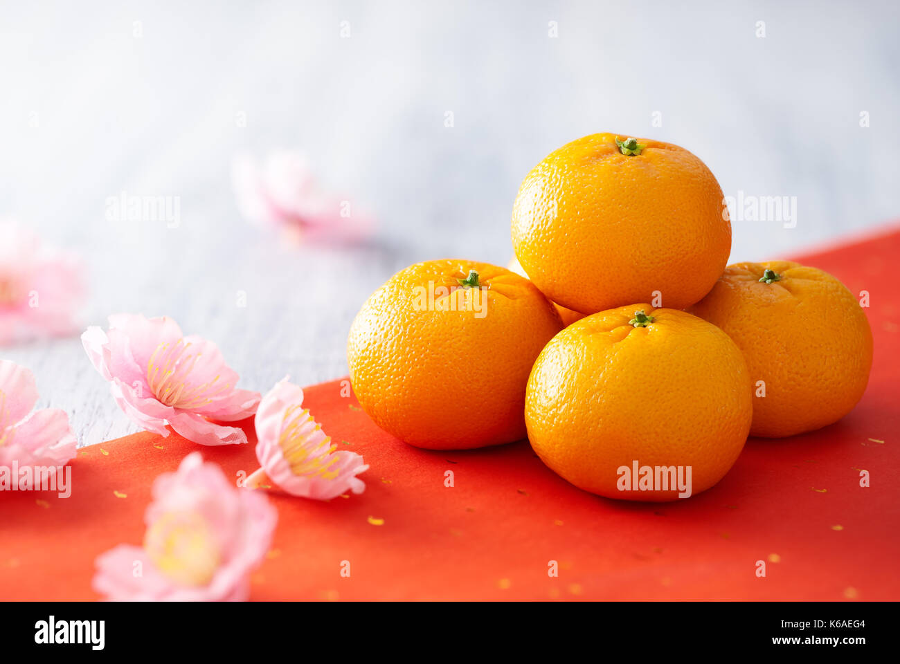 Chinese New Year - Mandarin orange and flowers Stock Photo