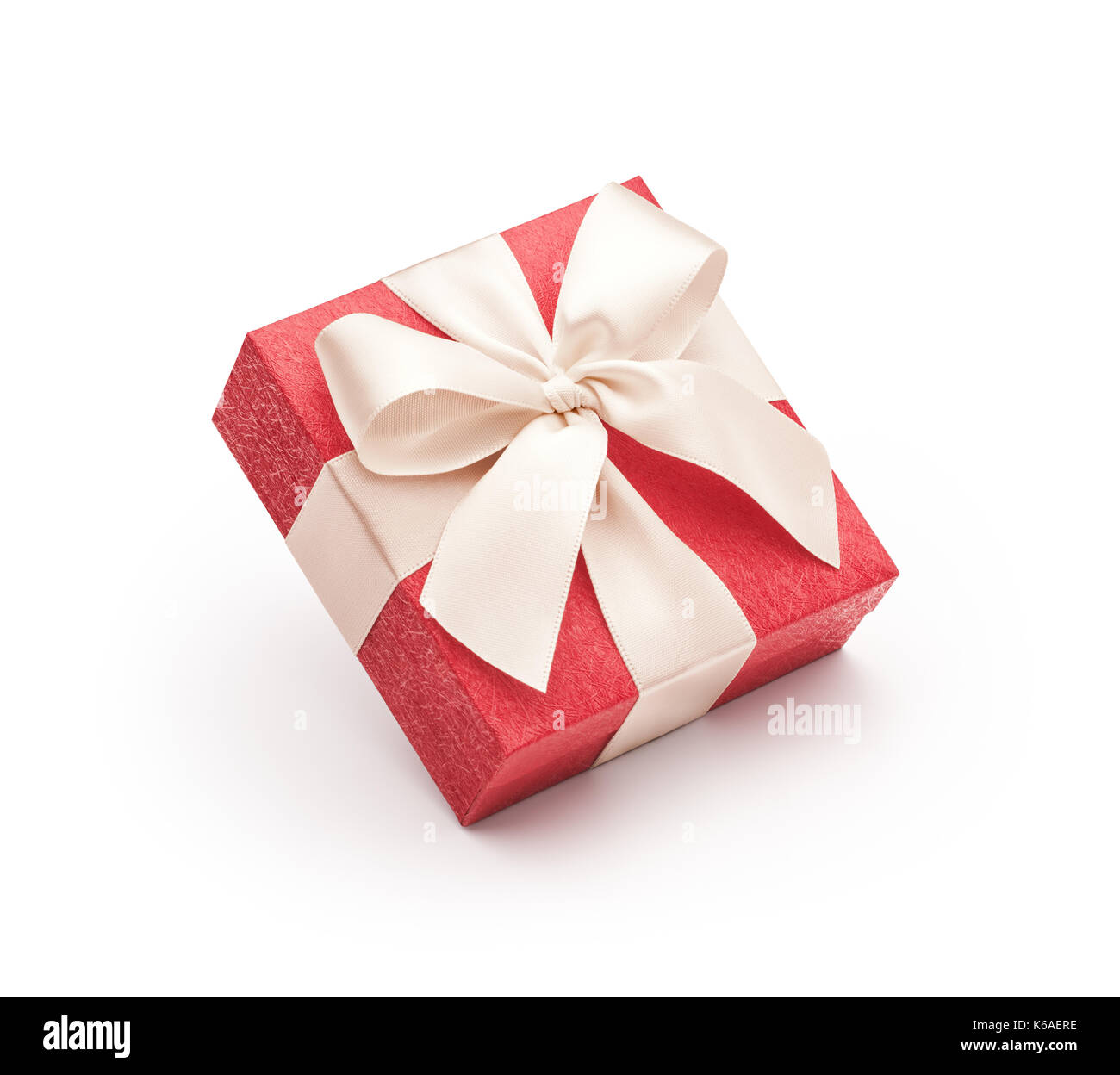 Red gift box with ribbon isolated on white background Stock Photo - Alamy