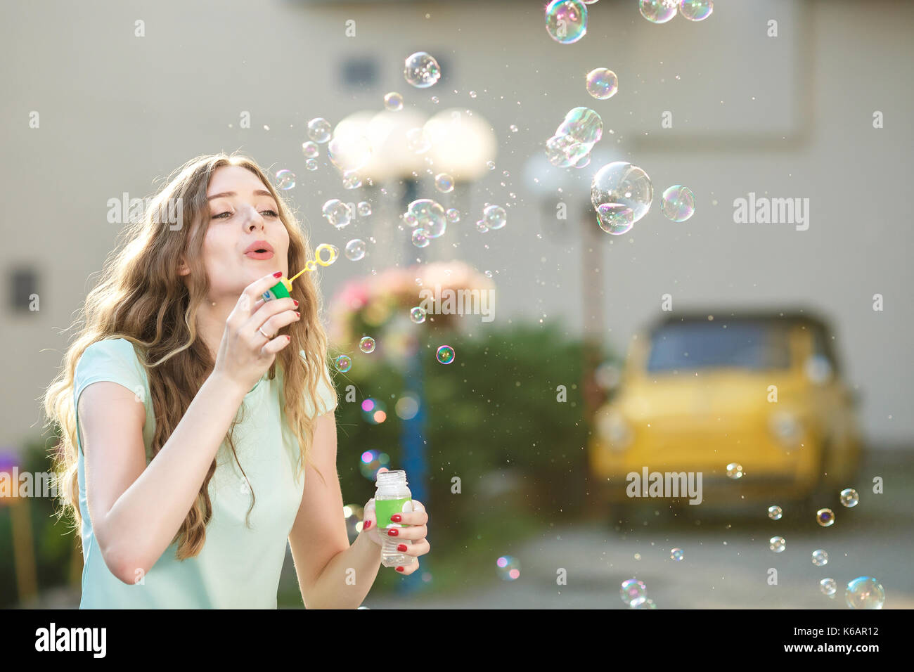 blowing soap bubbles