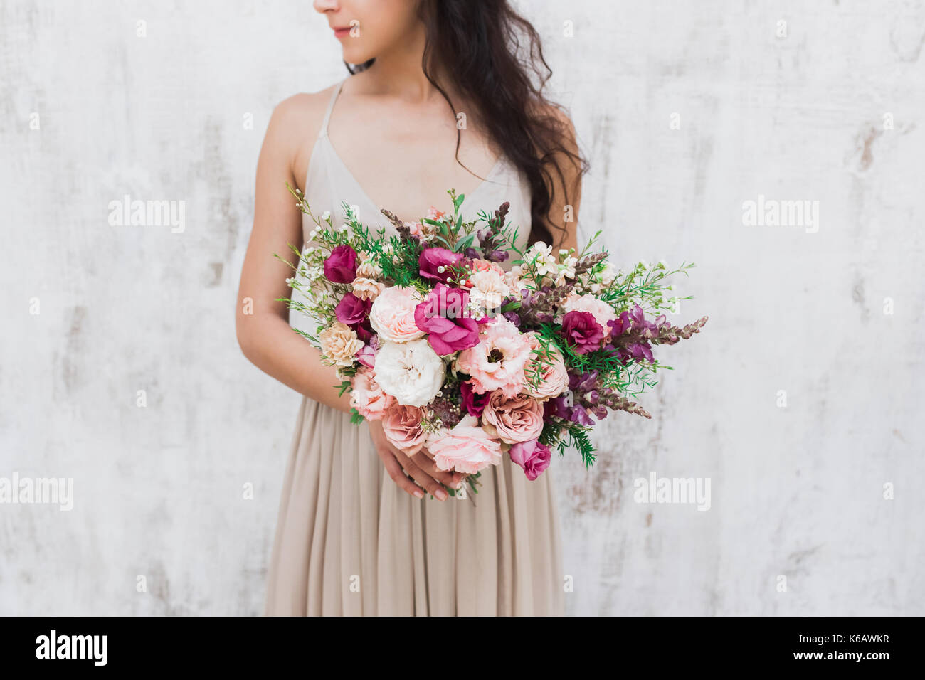 Сhic wedding bouquet of peonies and roses in hands of the bride Stock ...