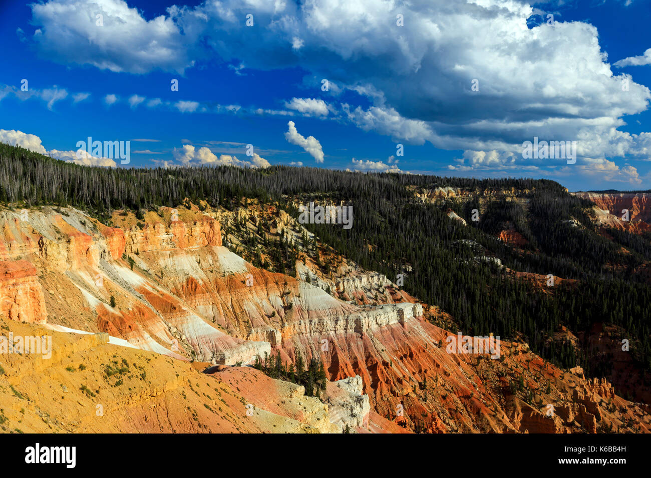 This is a view of the red rock formations and forested area of the amphitheater of Cedar Breaks National Monument, Utah, USA. Stock Photo