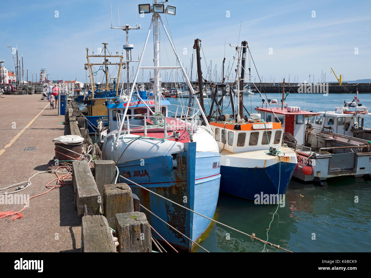 Fishing boats trawler boat moored in the harbour in summer Scarborough North Yorkshire England UK United Kingdom GB Great Britain Stock Photo