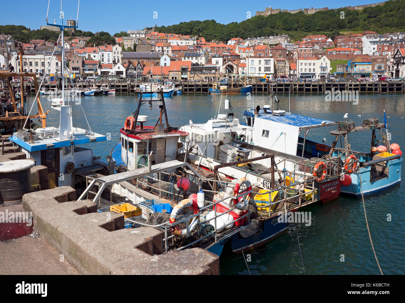 Fishing boats boat moored in the harbour in summer Scarborough North Yorkshire England UK United Kingdom GB Great Britain Stock Photo