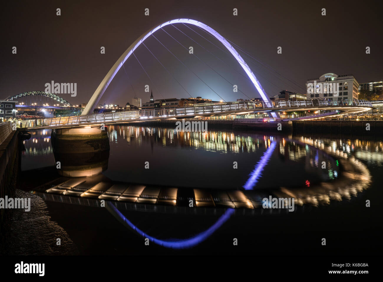 The Newcaste-Upon-Tyne/Gateshead quayside at night, showing the Milennium and Tyne bridges and Newcastle quayside Stock Photo