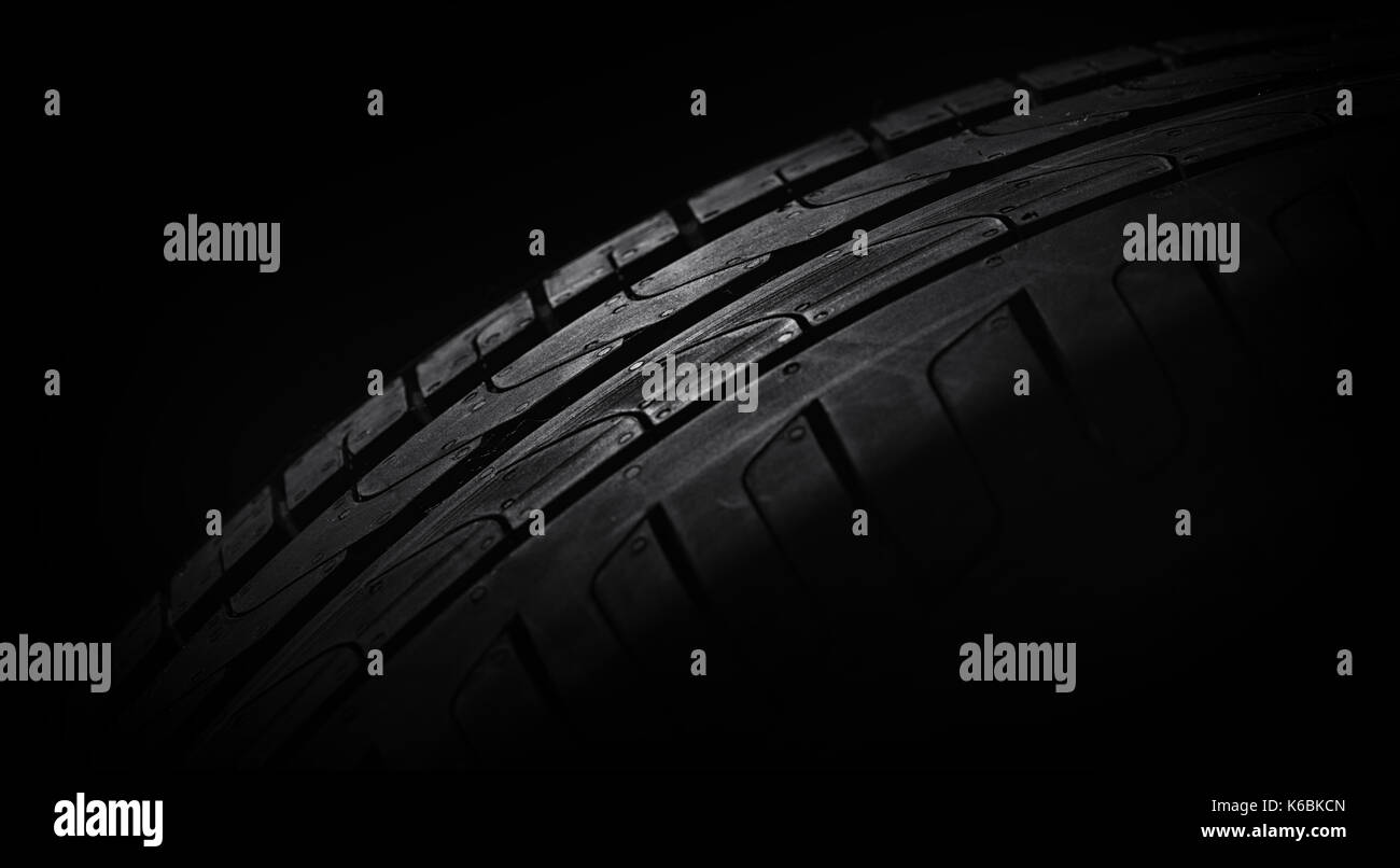 Tire stack on background. Selective focus.Wheel Pattern Stock Photo