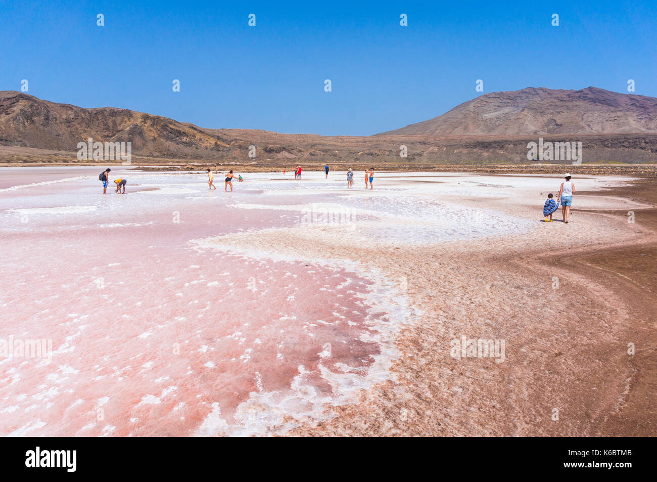 CAPE VERDE SAL Tourists walking around the salt evaporation beds or  Disused Salt pans  Pedra De Lume, Pedra di Lumi, Sal island, Cape Verde, Africa Stock Photo