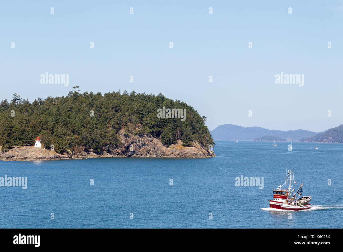 Fishing Boat between the Gulf Islands at Vancouver Island, British Columbia, Canada. Stock Photo