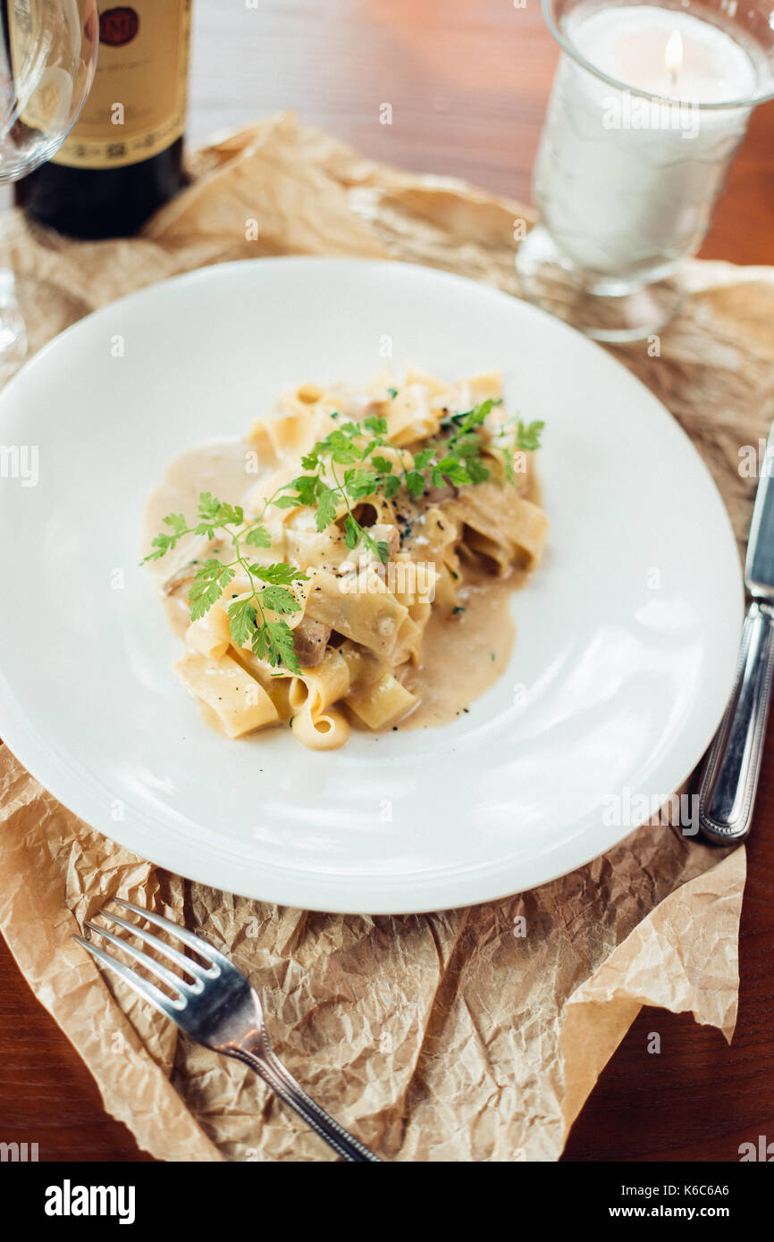 spinach fettuccine on plate Italian food style Stock Photo Alamy
