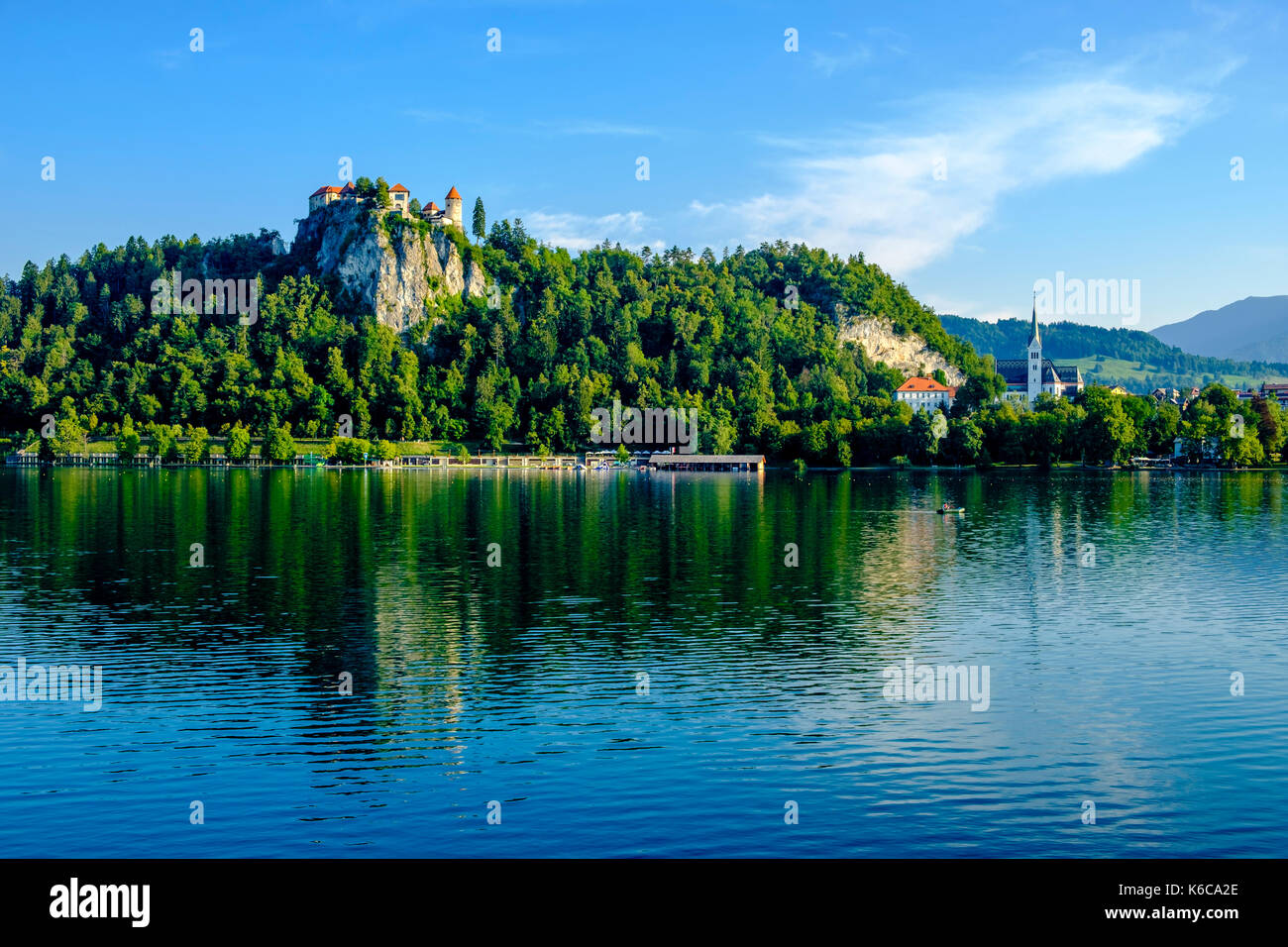 Bled Castle, Blejski grad, located on a rocky mountain, seen across Lake Bled, Blejsko jezero Stock Photo