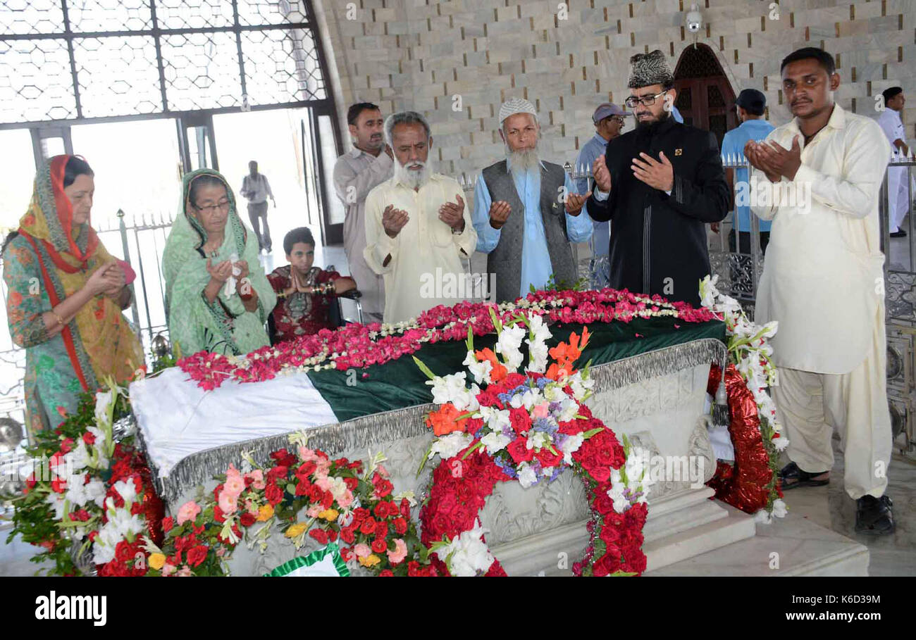 Family members of Father of Nation, Muhammad Ali Jinnah, the founder of Pakistan offering Fateha for his departed soul on the occasion of his death anniversary, at mausoleum in Karachi on Monday, September 11, 2017. Stock Photo