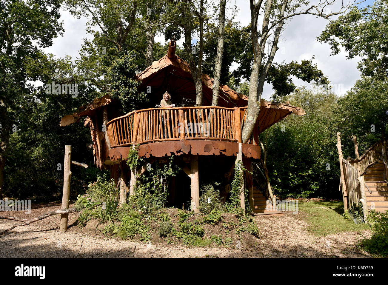 Ditchling Sussex, UK. 12th Sep, 2017. A new tree house has been unveiled at Blackberry Wood campsite near Ditchling in Sussex . The new upmarket tree house called Piggledy has been built by campsite owner Tim Johnson (pictured) and is larger than the original next door tree house called Higgledy . The quirky campsite is well known for having a London bus and an old Wessex helicopter where people can also stay in peaceful surroundings nestled just north of the South Downs National Park Credit: Simon Dack/Alamy Live News Stock Photo