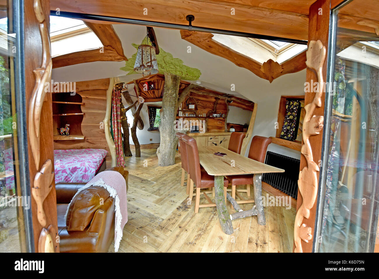 Ditchling Sussex, UK. 12th Sep, 2017. A new tree house has been unveiled at Blackberry Wood campsite near Ditchling in Sussex . The new upmarket tree house called Piggledy has been built by campsite owner Tim Johnson and is larger than the original next door tree house called Higgledy . The quirky campsite is well known for having a London bus and an old Wessex helicopter where people can also stay in peaceful surroundings nestled just north of the South Downs National Park Credit: Simon Dack/Alamy Live News Stock Photo