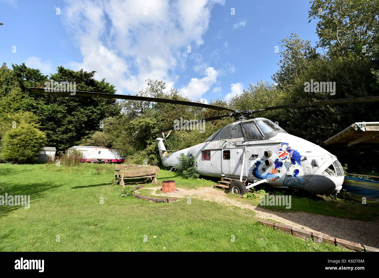 Ditchling Sussex, UK. 12th Sep, 2017. A new tree house has been unveiled at Blackberry Wood campsite near Ditchling in Sussex . The new upmarket tree house called Piggledy has been built by campsite owner Tim Johnson and is larger than the original next door tree house called Higgledy . Credit: Simon Dack/Alamy Live News Stock Photo