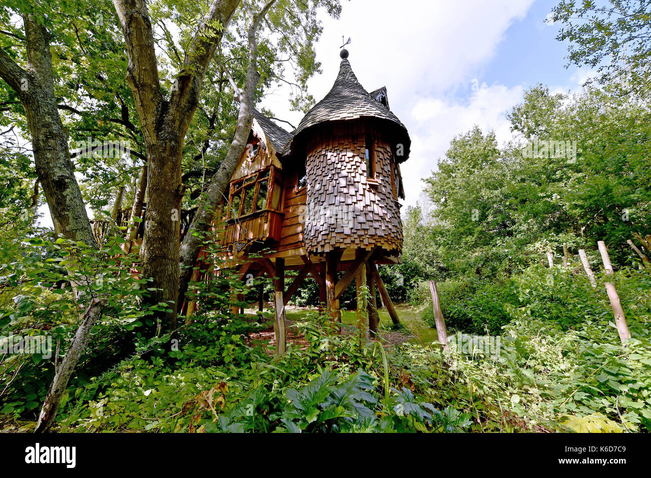 Ditchling Sussex, UK. 12th Sep, 2017. Higgledy Tree House next door to a new tree house unveiled at Blackberry Wood campsite near Ditchling in Sussex . The new upmarket tree house called Piggledy has been built by campsite owner Tim Johnson and is larger than the original next door tree house called Higgledy . Credit: Simon Dack/Alamy Live News Stock Photo