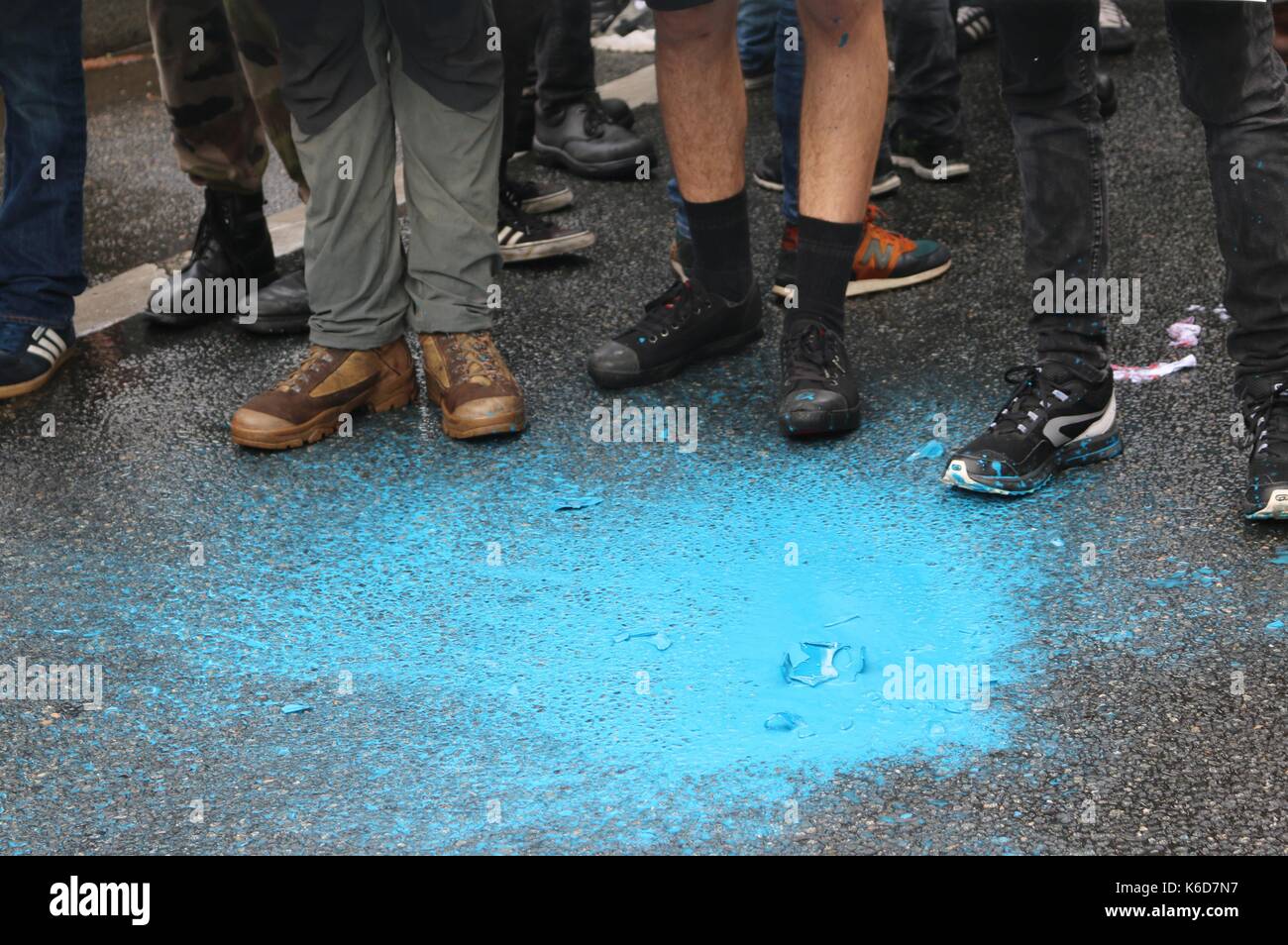 Paris, France. 12th Sep, 2017. A paintbomb is thrown during a Loi Travail march in Paris Credit: Conall Kearney/Alamy Live News Stock Photo
