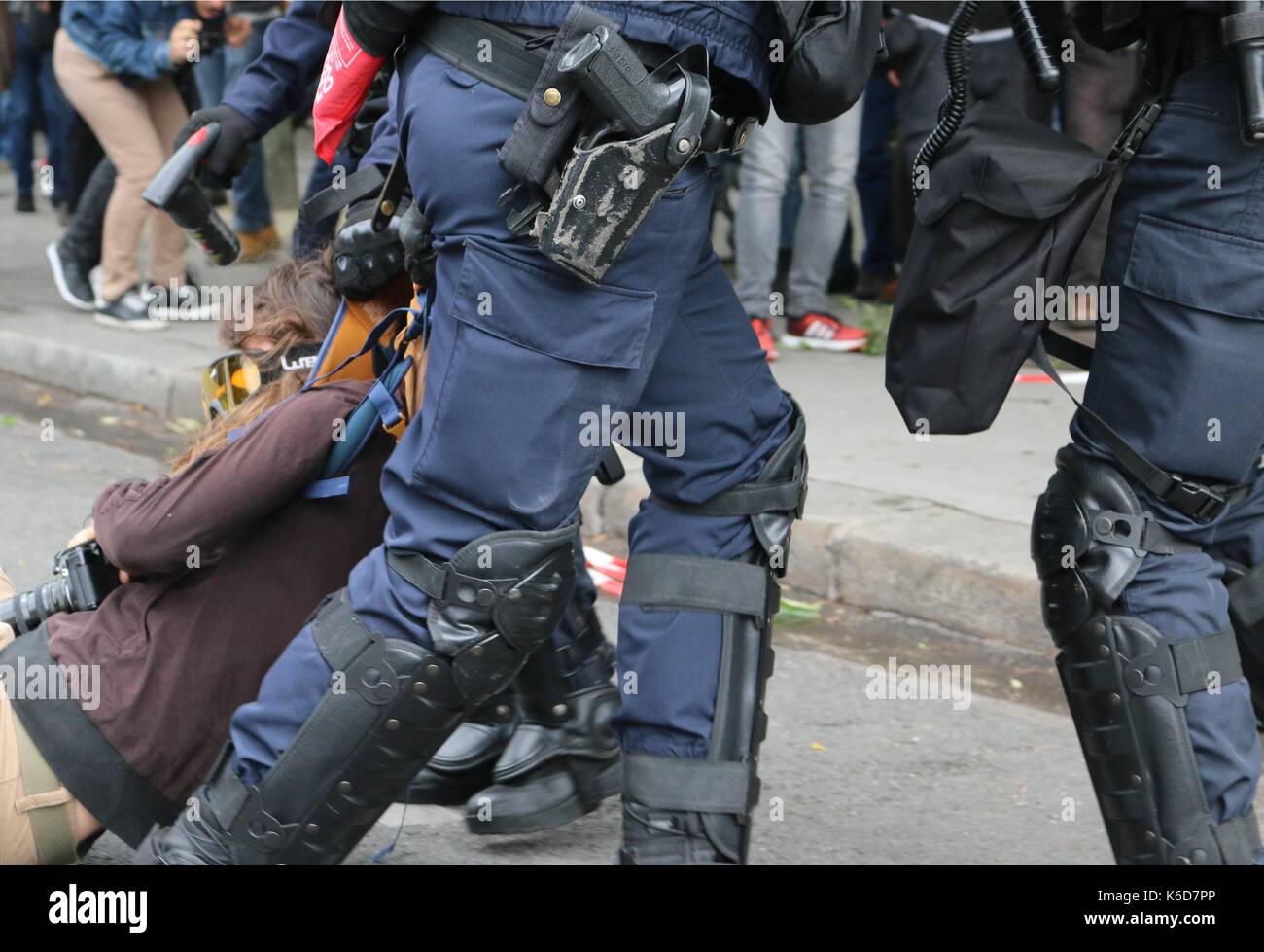 Paris, France. 12th Sep, 2017. A French snatch squad arrest protester after clashes following Loi Travail march in Paris Credit: Conall Kearney/Alamy Live News Stock Photo