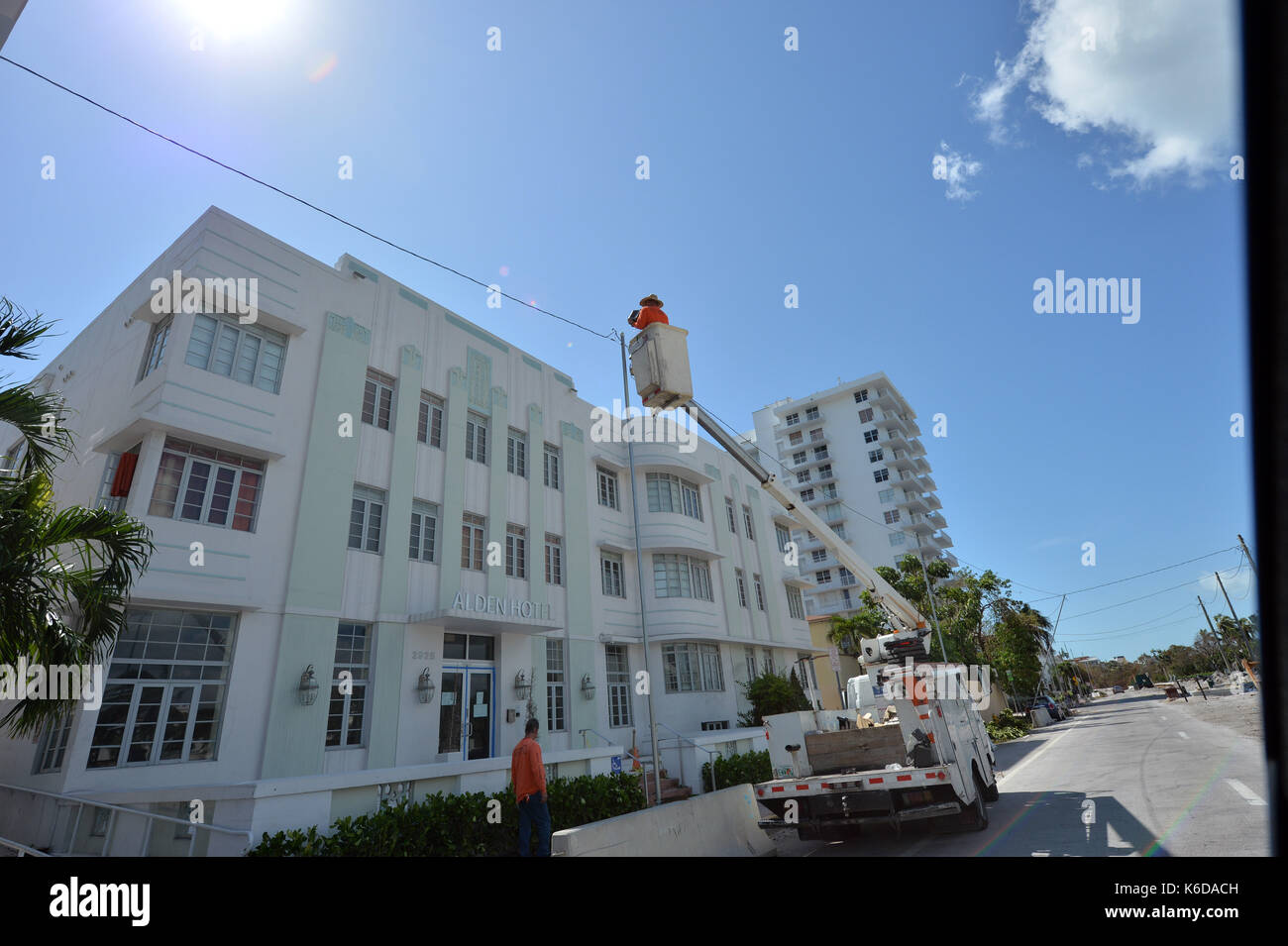 MIAMI BEACH, FL - SEPTEMBER 12: (EXCLUSIVE COVERAGE) ***NO NY DAILIES*** Residents waited hours to get over the causeway to return to South Beach after a mandatory evacuation only to find the Effects of Extreme Category 5 Hurricane Irma. The beach, Ocean Drive, Collins Ave, Miami Marina and even the Miami Port which are always packed with people, boats and cruise ships were all empty and had almost an erie dead calm to it as millatary black hawk helicopters patrolled the beaches as residents returned to their home's and business on September 12, 2017 in Miami Beach, Florida People: Collin Stock Photo