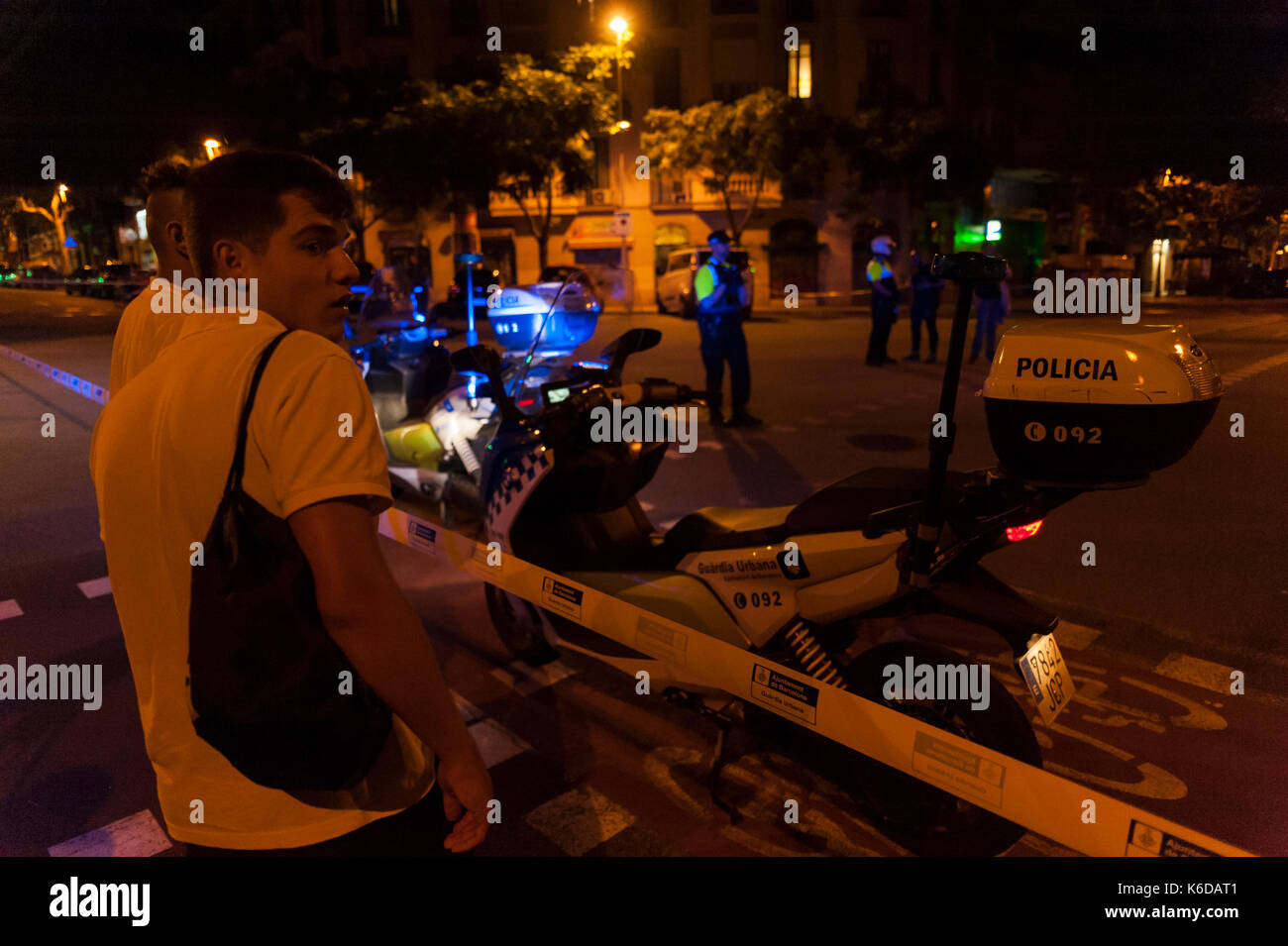 Barcelona, Catalonia. 12th Sep, 2017. Spain. September 12th, 2017. Several neighbors wait to be able to enter their homes as the police operation has cordoned off several blocks around the van suspected of housing an explosive device. Credit: Charlie Perez/Alamy Live News Stock Photo