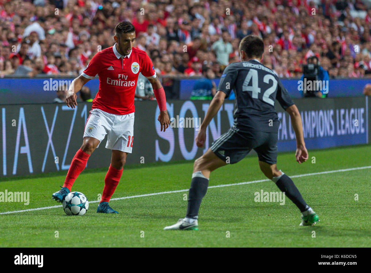 Lisbon, Portugal. 12th Sep, 2017. September 12, 2017. Lisbon, Portugal. Benfica's forward from Argentina Toto Salvio (18) and CSKA's defender from Russia Georgi Schennikov (42) during the game of the 1st round of the UEFA Champions League Group A, SL Benfica v CSKA Moscow Credit: Alexandre de Sousa/Alamy Live News Stock Photo