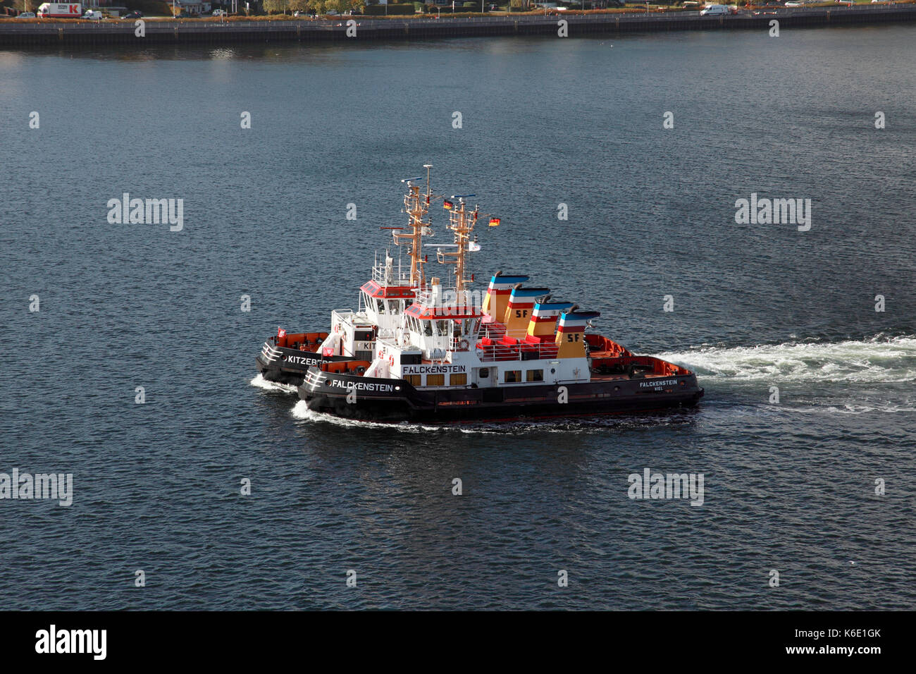 Tug boats Falckenstein and Kitzeberg entering the port of Kiel, northern Germany Stock Photo