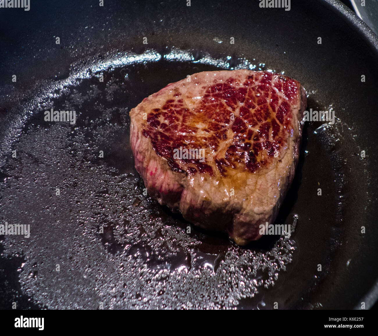 Steak in the frying pan Stock Photo Alamy