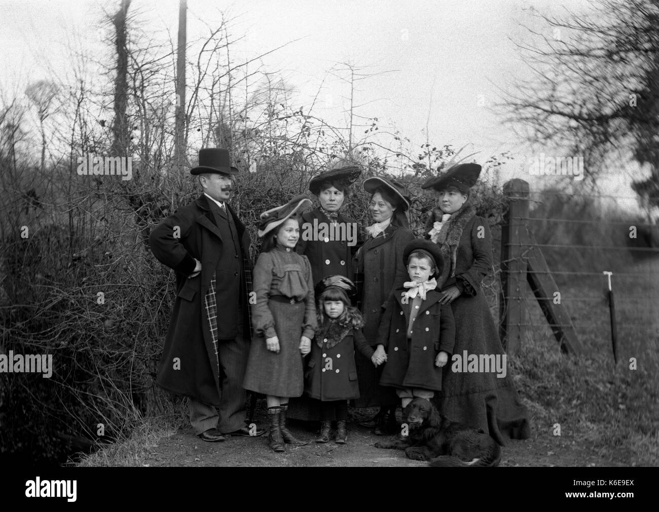AJAXNETPHOTO. 1891-1910 (APPROX). SAINT-LO REGION, NORMANDY.FRANCE. - A FAMILY GROUP POSING FOR THE CAMERA IN A COUNTRY LANDSCAPE.  PHOTOGRAPHER:UNKNOWN © DIGITAL IMAGE COPYRIGHT AJAX VINTAGE PICTURE LIBRARY SOURCE: AJAX VINTAGE PICTURE LIBRARY COLLECTION REF:AVL FRA 1890 04 Stock Photo