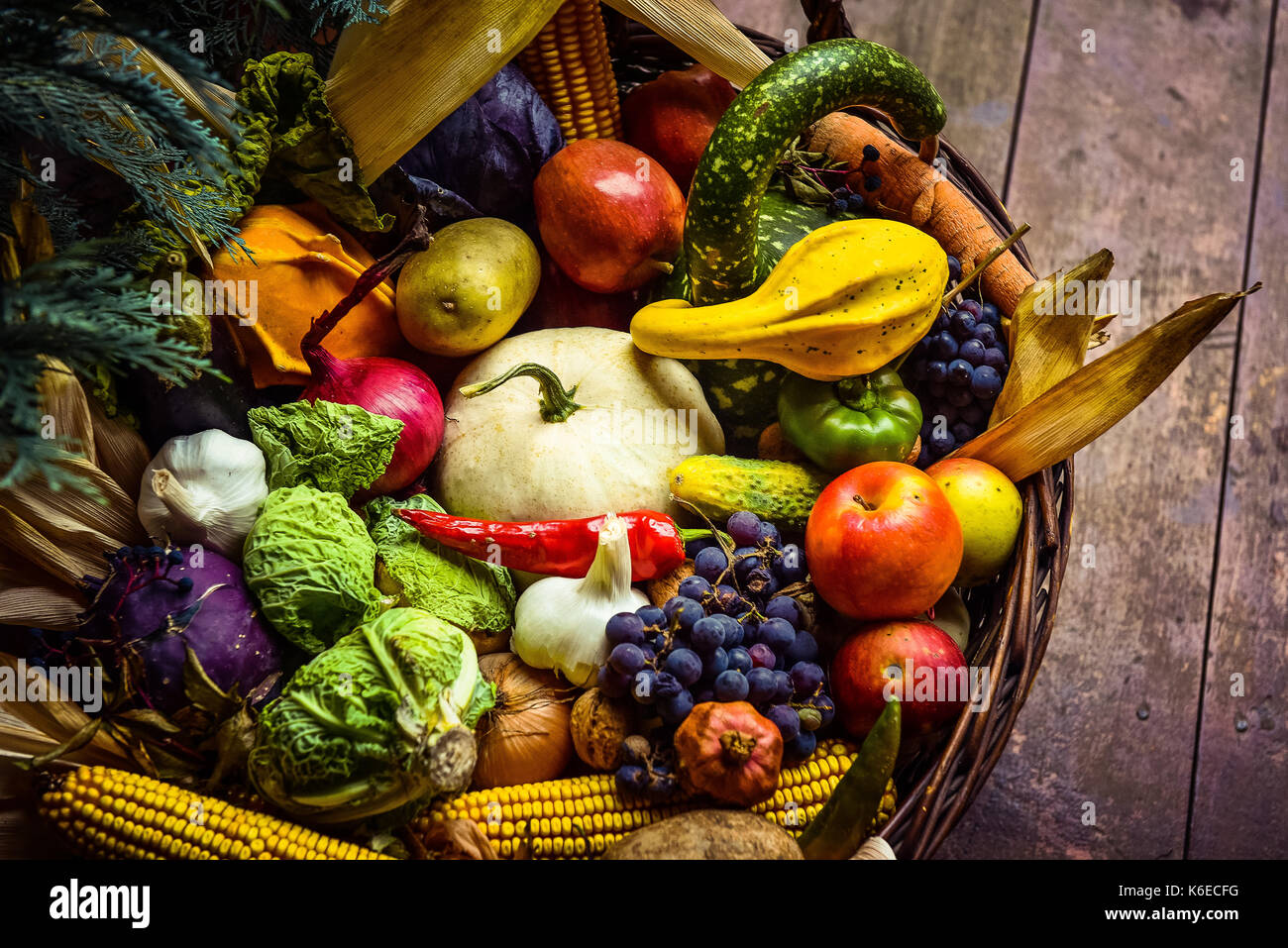 Heap of fresh fruits and vegetables in basket. Autumn concept Stock ...