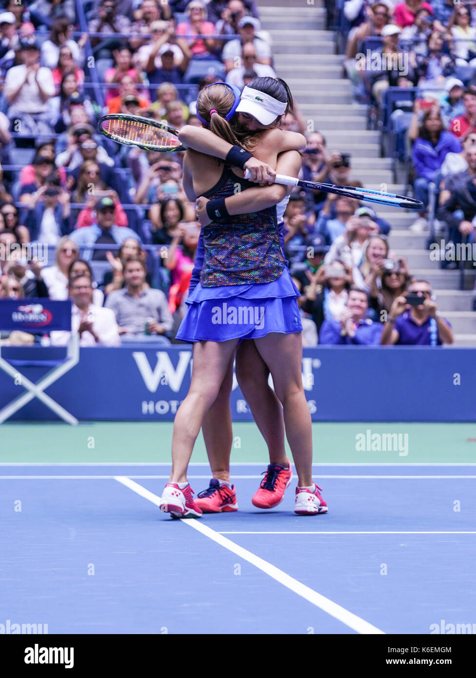 Martina Hingis holding a trophy, representing the intangible aspects of legacy