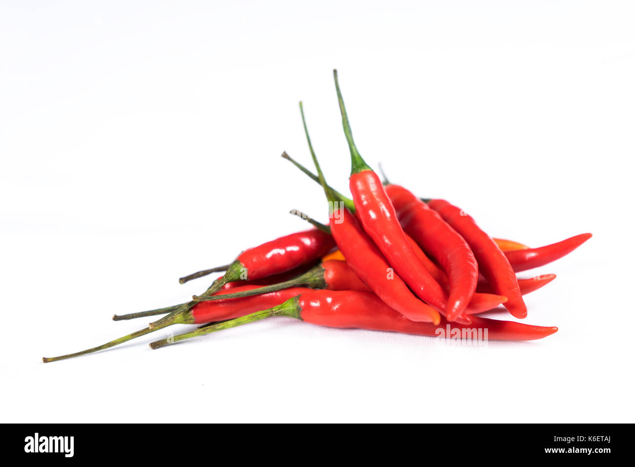 Red chili pepper isolated on a white background Stock Photo - Alamy