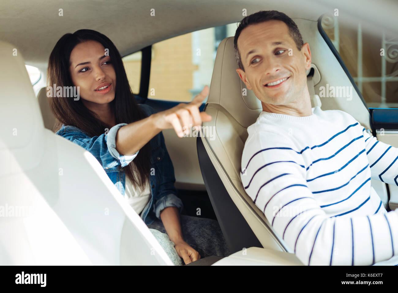 Woman finger pointing street hi-res stock photography and images - Alamy