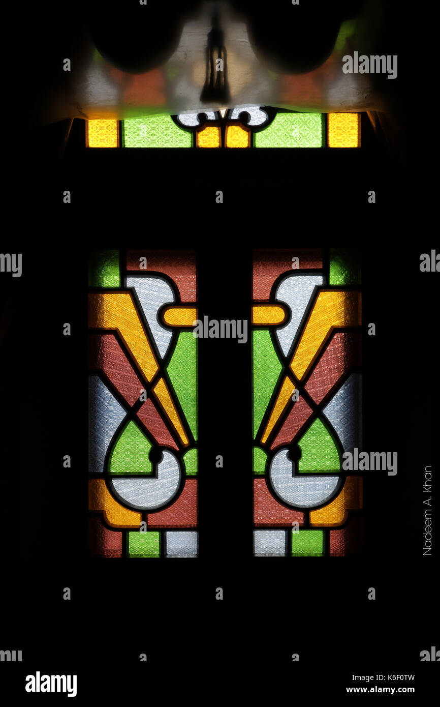 Colourful decorative windows inside at Bhong Mosque Pakistan. Stock Photo