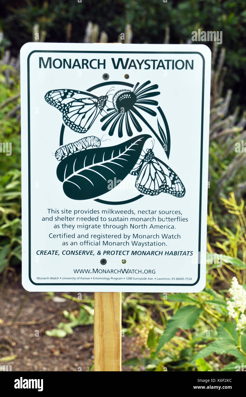 A Green and White Sign in a Park for a Monarch Waystation Stock Photo ...
