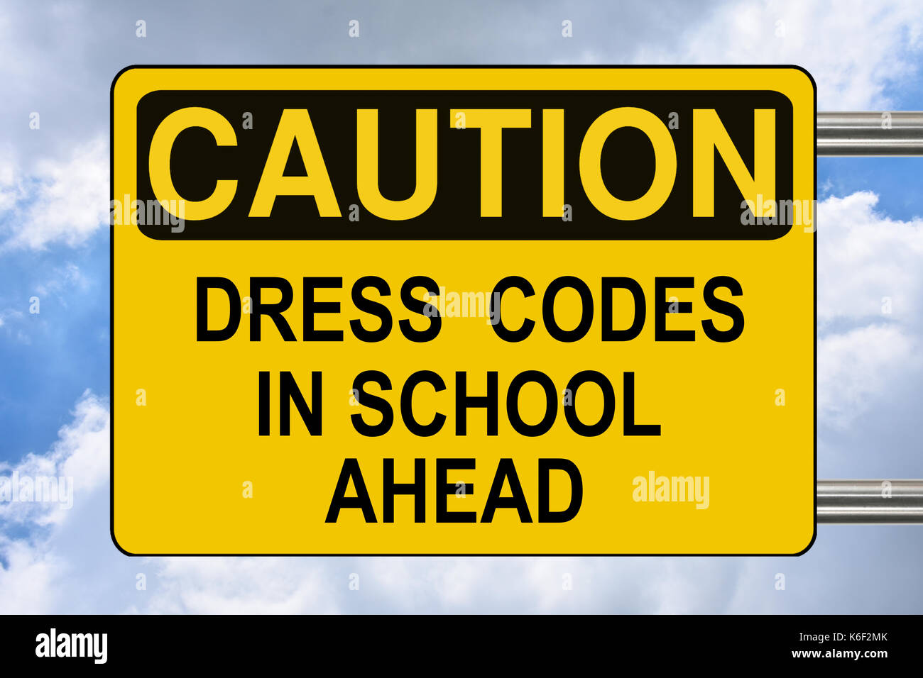 Dress code in school ahead, yellow warning sign Stock Photo